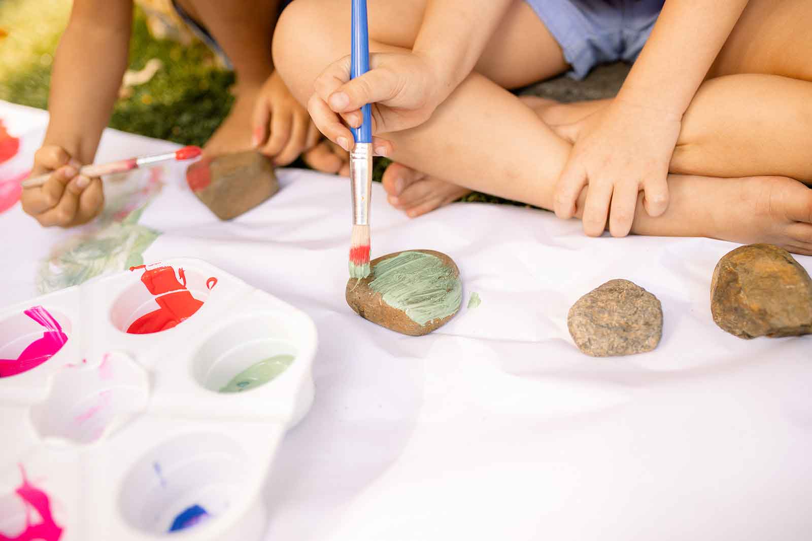 Painting rocks at kindy